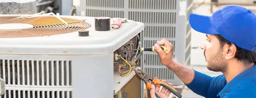 Outdoor condenser service in progress at a residential property